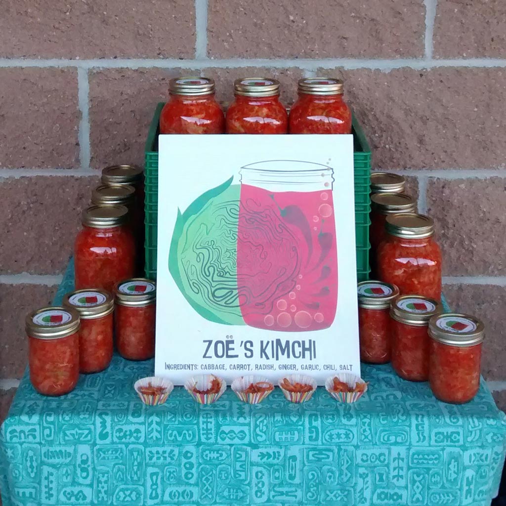 Zoë's Ferments stand with samples at a farmers market